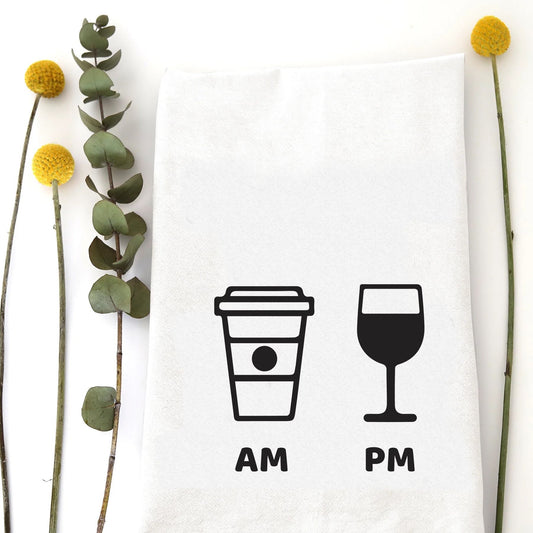A tea towel with a picture of a coffee cup saying AM and a picture of a wine glass saying PM.