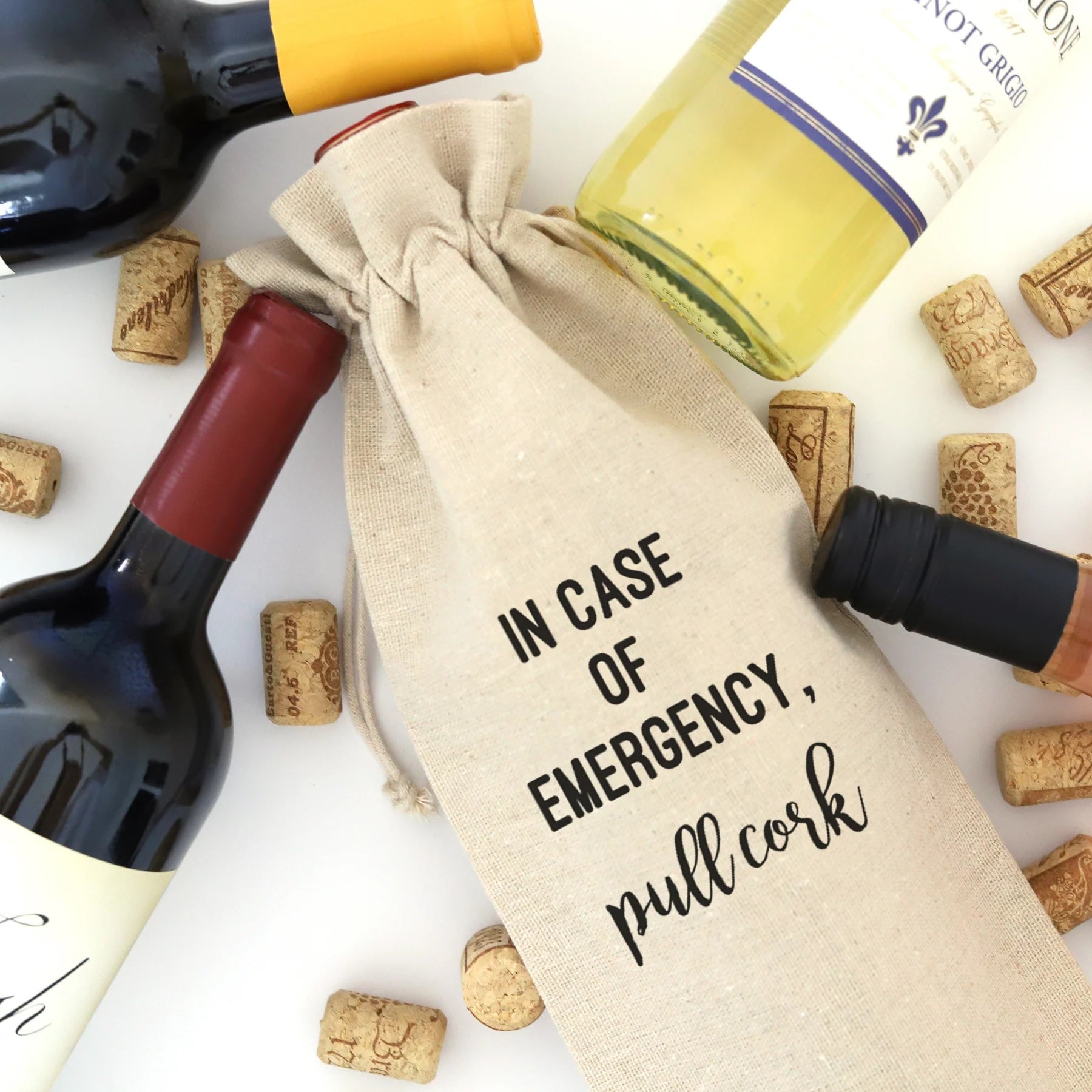 A wine bag with the words "In case of emergency, pull cork" printed on it.
